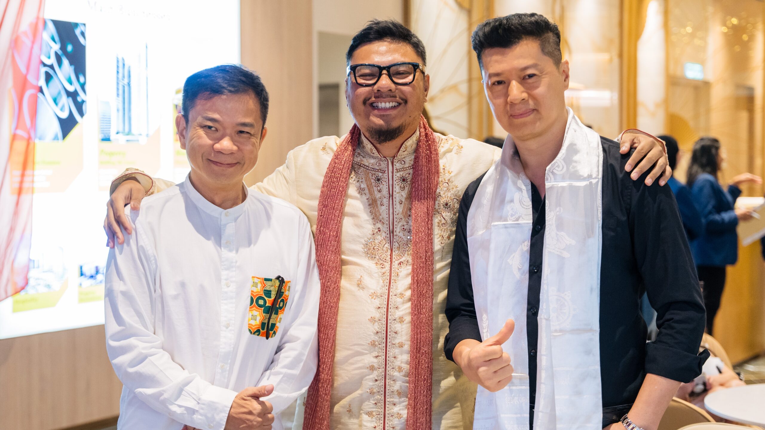 Abu Rizal (centre) flanked by Louis Lai (left) and Calvin Tan.