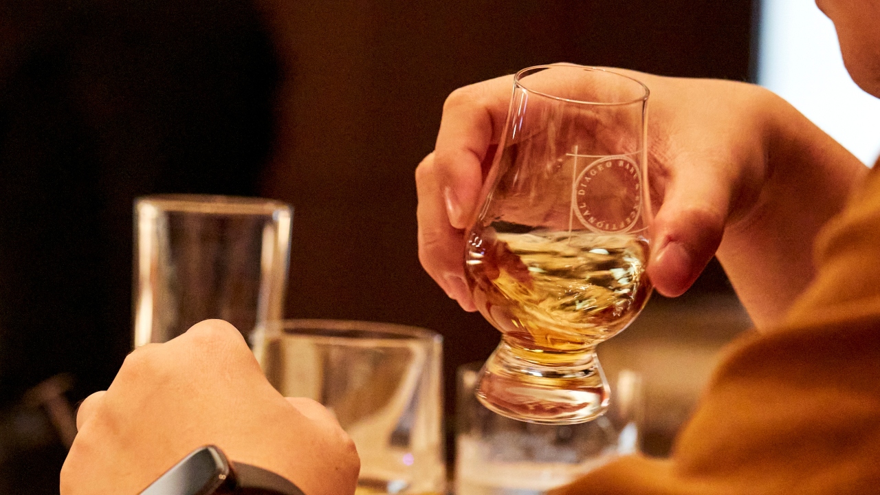 Savouring the rich aromas of the dram.