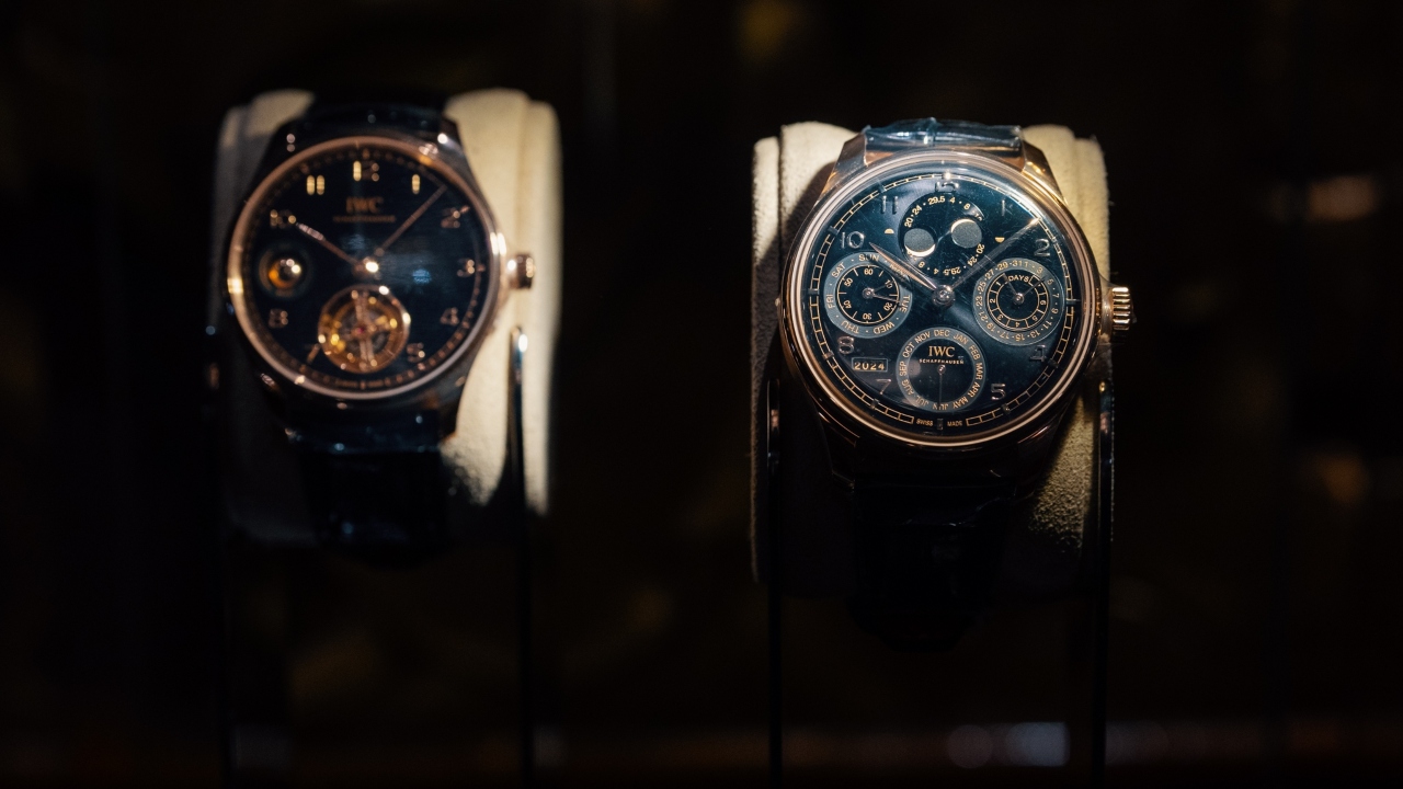 IWC Schaffhausen’s Portugeiser Hand-Wound Tourbillon Day & Night (left) and 44-mm Portugeiser Perpetual Calendar.